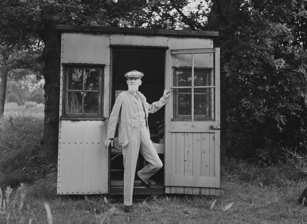 George Bernard Shaw modeling a potential shed design for fantasy football fans. (George Konig & Chris Ware/Keystone Features/Hulton Archive/Getty Images)