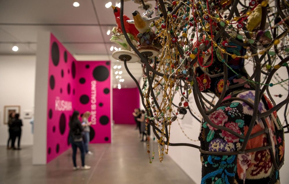 Nick Cave's &quot;Soundsuit,&quot; created in 2009, is part of the gallery next to Kusama's infinity room showing how she's influenced contemporary art. (Robin Lubbock/WBUR)