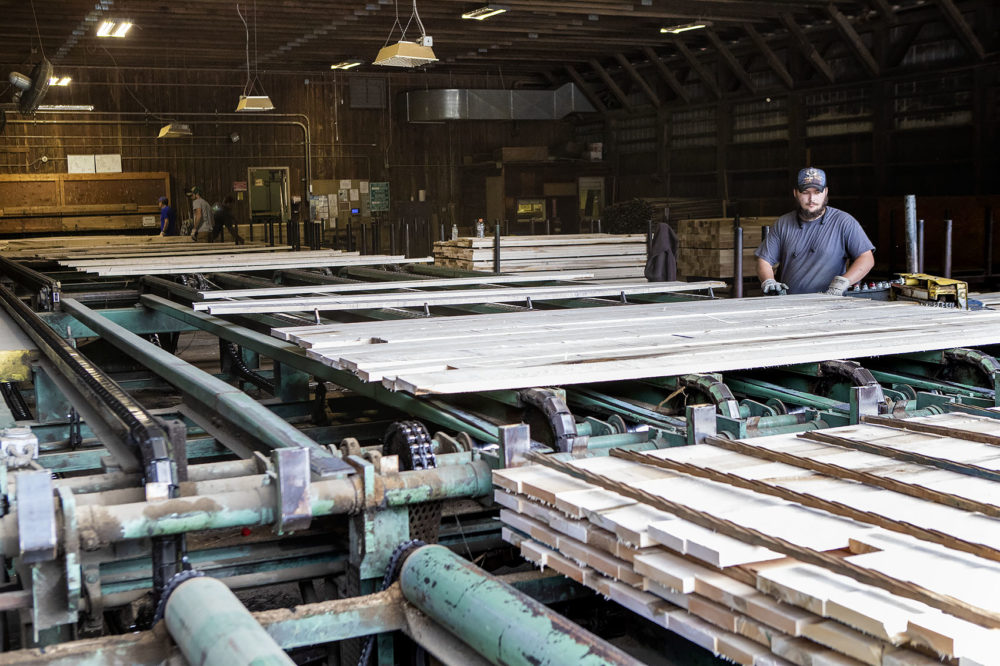 Oak boards are packed at Cersosimo Lumber. (Jesse Costa/WBUR)