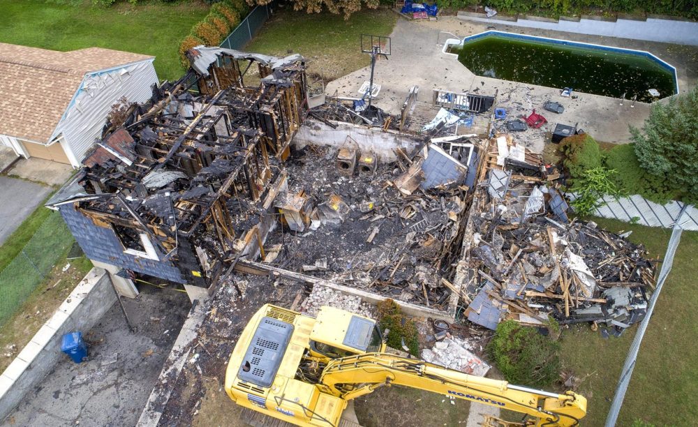 Last year's Columbia Gas disaster in the Merrimack Valley displaced thousands of people and damaged homes such as this one on Jefferson Street in Lawrence. (Robin Lubbock/WBUR)