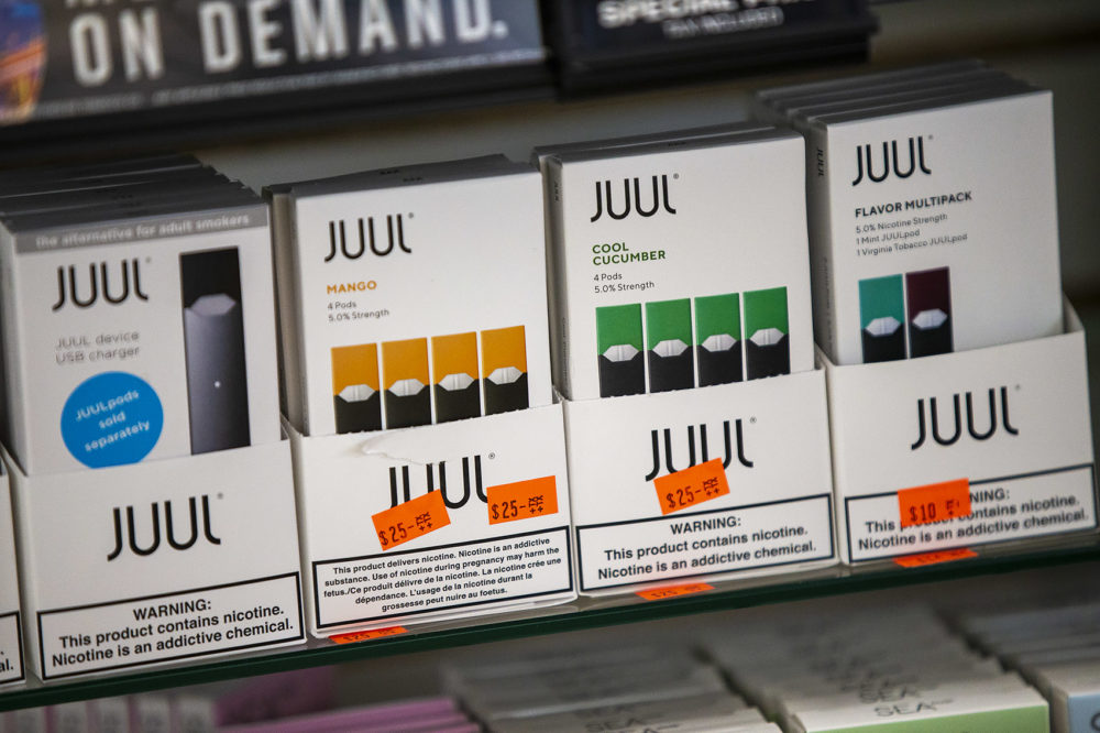Various Juul products on display at Fast Eddie's Smoke Shop in Allston (Jesse Costa/WBUR)