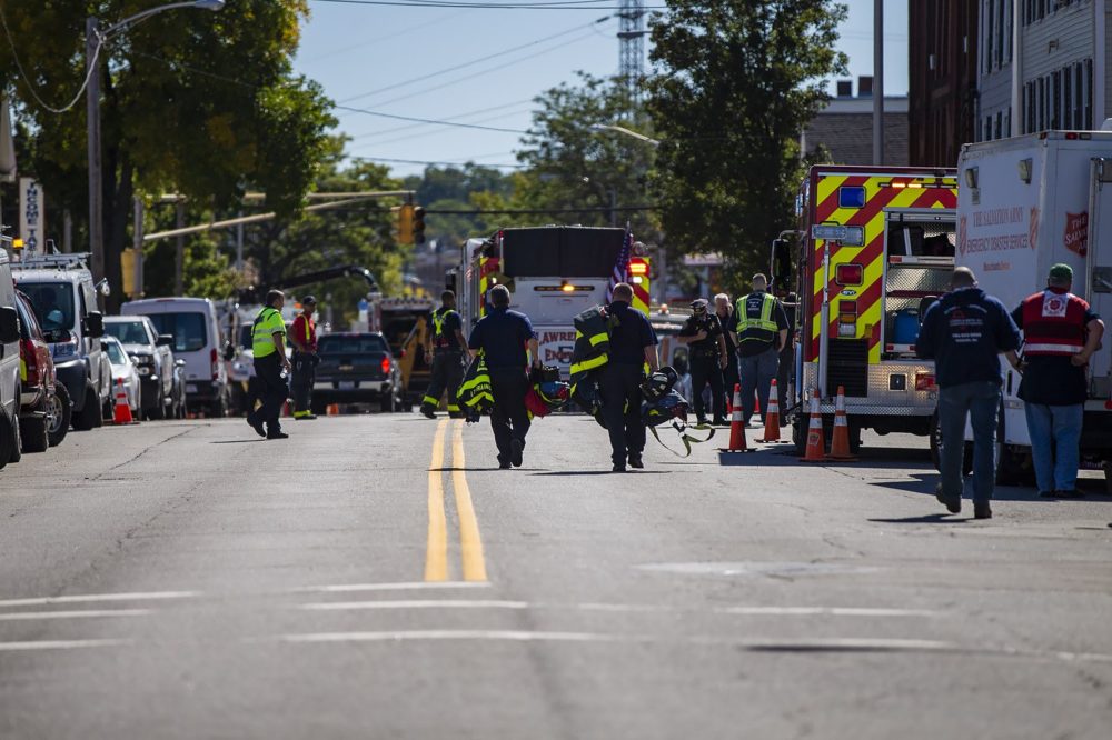 Police and fire personnel investigate a gas leak along South Broadway in Lawrence on Friday. (Jesse Costa/WBUR)