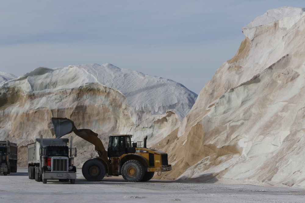 Road salt is loaded into trucks at Eastern Minerals Inc., on Jan. 3, 2018, in Chelsea, Mass. (Bill Sikes/AP)