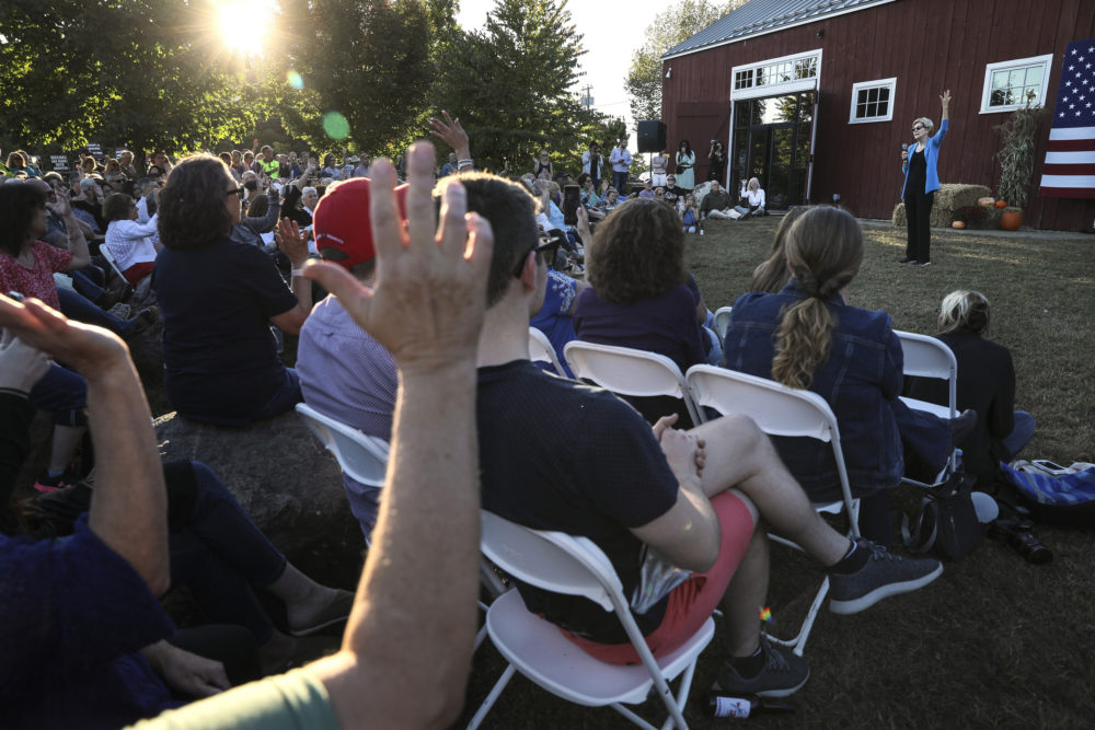Democratic presidential candidate Sen. Elizabeth Warren, D-Mass., asks the audience a question while speaking at a campaign event Friday in Hollis, N.H. (Cheryl Senter/AP)