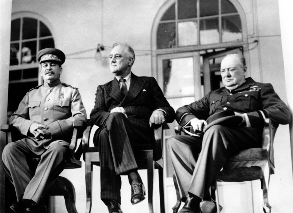 Soviet Union Premier Josef Stalin, U.S. President Franklin D. Roosevelt and British Prime Minister Winston Churchill sit at the Teheran Conference in the capital of Persia, Iran, on Nov. 28, 1943. (British official photo/AP)