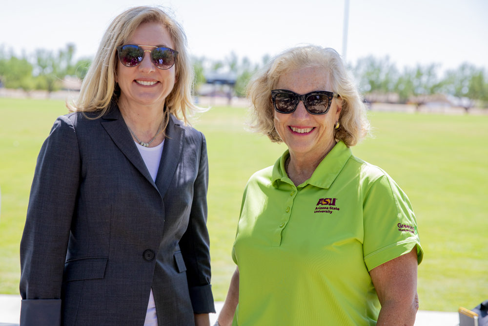 Kathryn Sorensen (left) is water director for the City of Phoenix, which provides water to 1.7 million people. Jo Ellen Alberhasky is the ASU researcher who brought the technology to the soccer fields at ASU West. (Richard Holland/ASU)