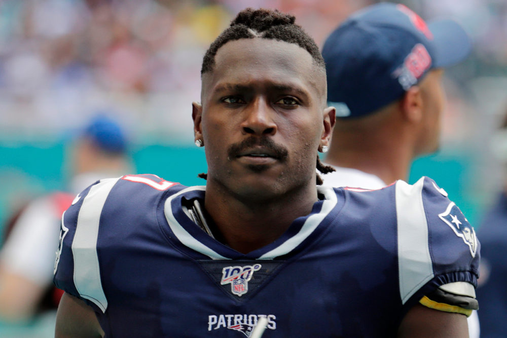 New England Patriots wide receiver Antonio Brown (17) on the sidelines during the first half at an NFL football game against the Miami Dolphins in Miami Gardens, Fla. The Patriots released Brown on Friday, Sept. 20, 2019. (Lynne Sladky, AP)