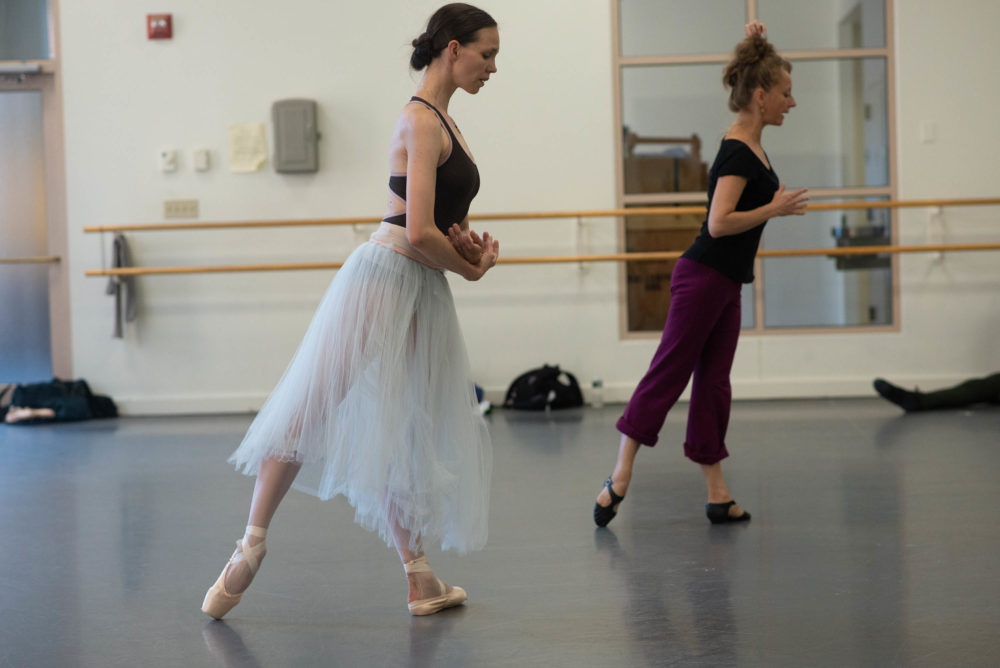 Larissa Ponomarenko (back right) works with Viktorina Kapitonova in rehearsal for &quot;Giselle.&quot; (Courtesy Brooke Trisolini/Boston Ballet)