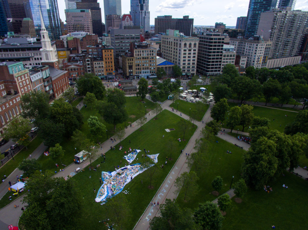 Young climate activists constructed a 100-foot mosaic out of 1,200 individually painted tiles. (Courtesy Our Climate)