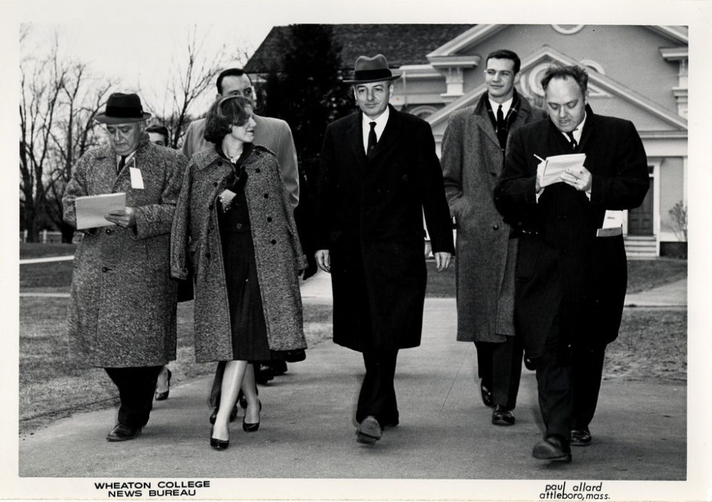 Arthur Flemming, center, talks with members of the press while attending an event in Massachusetts in February 1960. (Paul Allard/Courtesy of Wheaton College)
