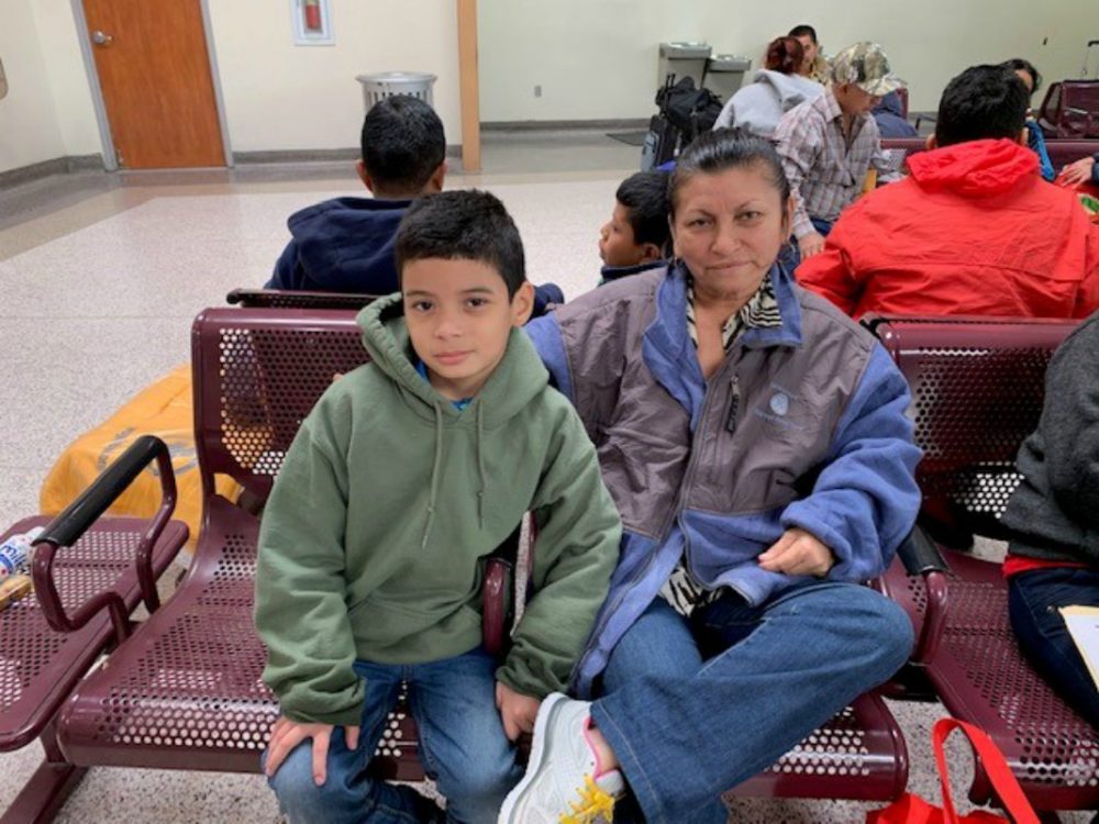 Freddie and his mom at the bus station in McAllen, Texas. (Courtesy)