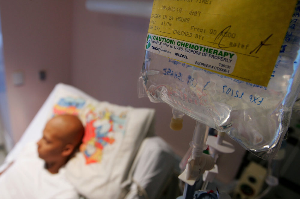 Eighteen-year-old cancer patient Patrick McGill lies in his hospital bed while receiving IV chemotherapy treatment for a rare form of cancer at the UCSF Comprehensive Cancer Center Childrens Hospital Aug. 18, 2005 in San Francisco, Calif. (Justin Sullivan/Getty Images)