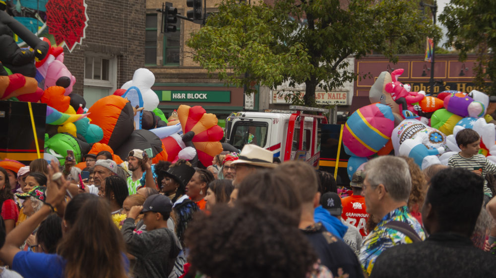 The parade grew in size as it reached Upham's Corner. (OJ Slaughter for WBUR)