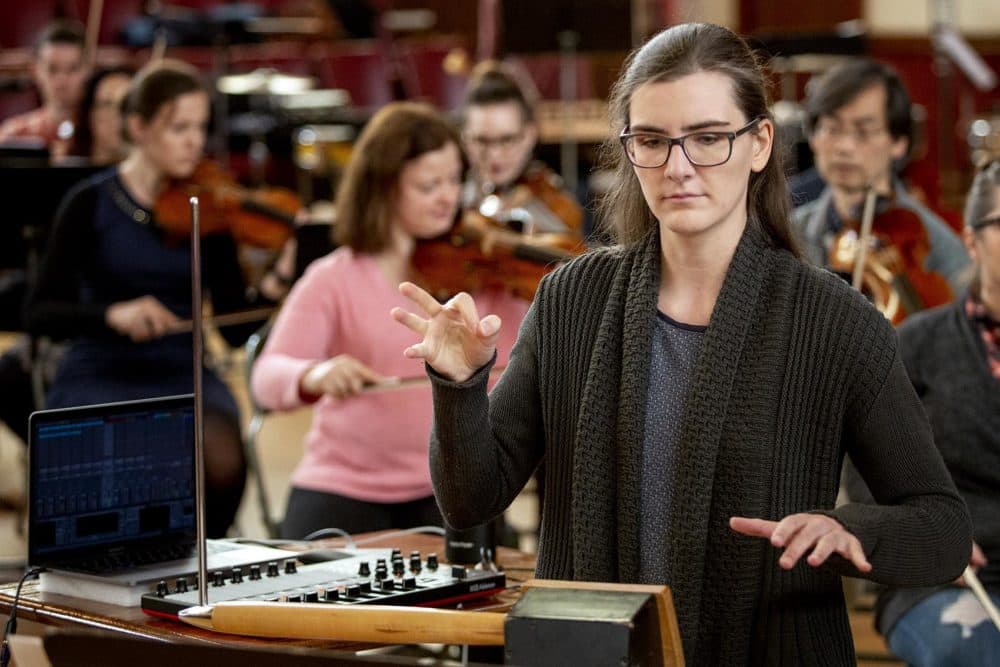 Theremin virtuoso Carolina Eyck rehearses &quot;Sirens: A Concerto for Theremin and Orchestra&quot; with the Boston Modern Orchestra Project. (Robin Lubbock/WBUR)