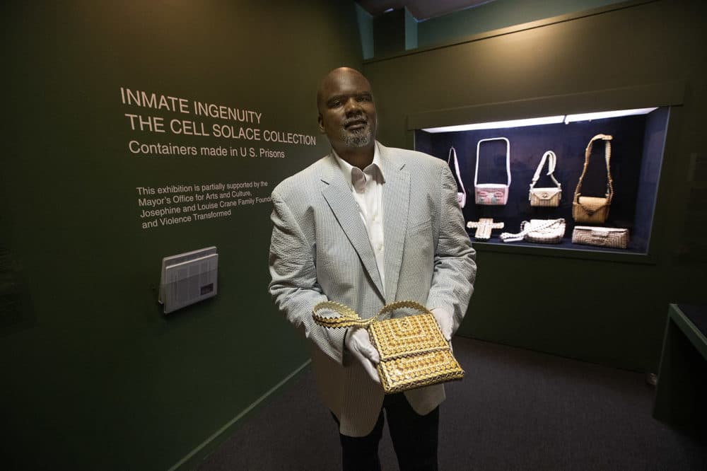 Antonio Inniss is the collector of art created by prison inmates made of woven cigarette cartons and papers and is being shown at The Museum of the National Center of Afro American Artists in Roxbury. (Jesse Costa/WBUR)