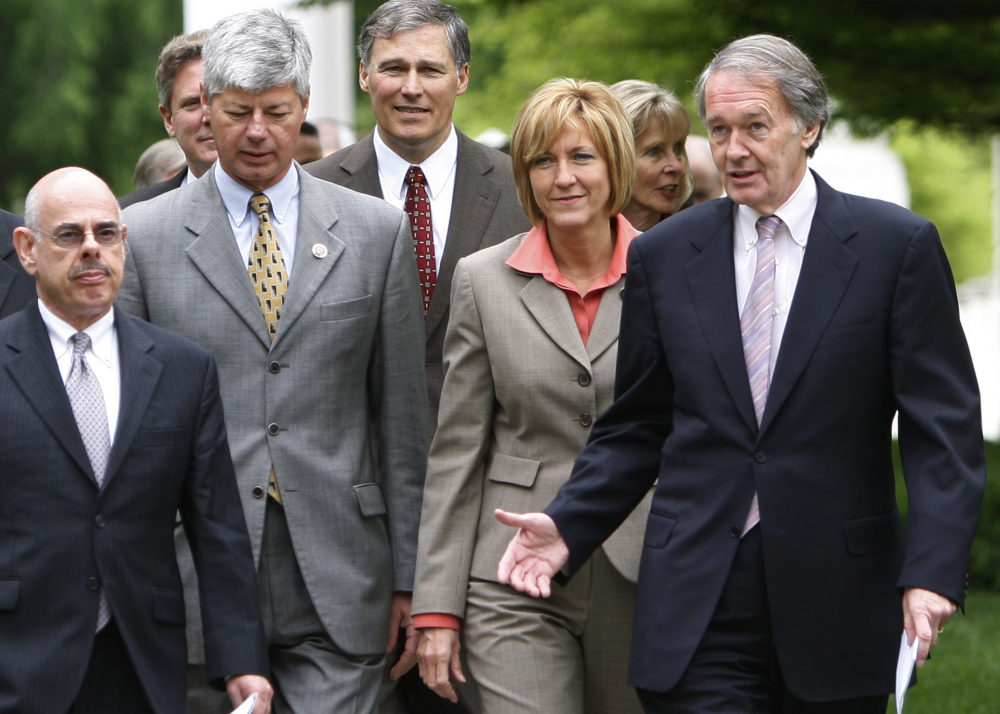 Then-Rep. Ed Markey, right, and other lawmakers leave the White House on May 5, 2009. At left is Rep. Henry Waxman, D-Calif., who coauthored climate legislation with Markey. (Ron Edmonds/AP)