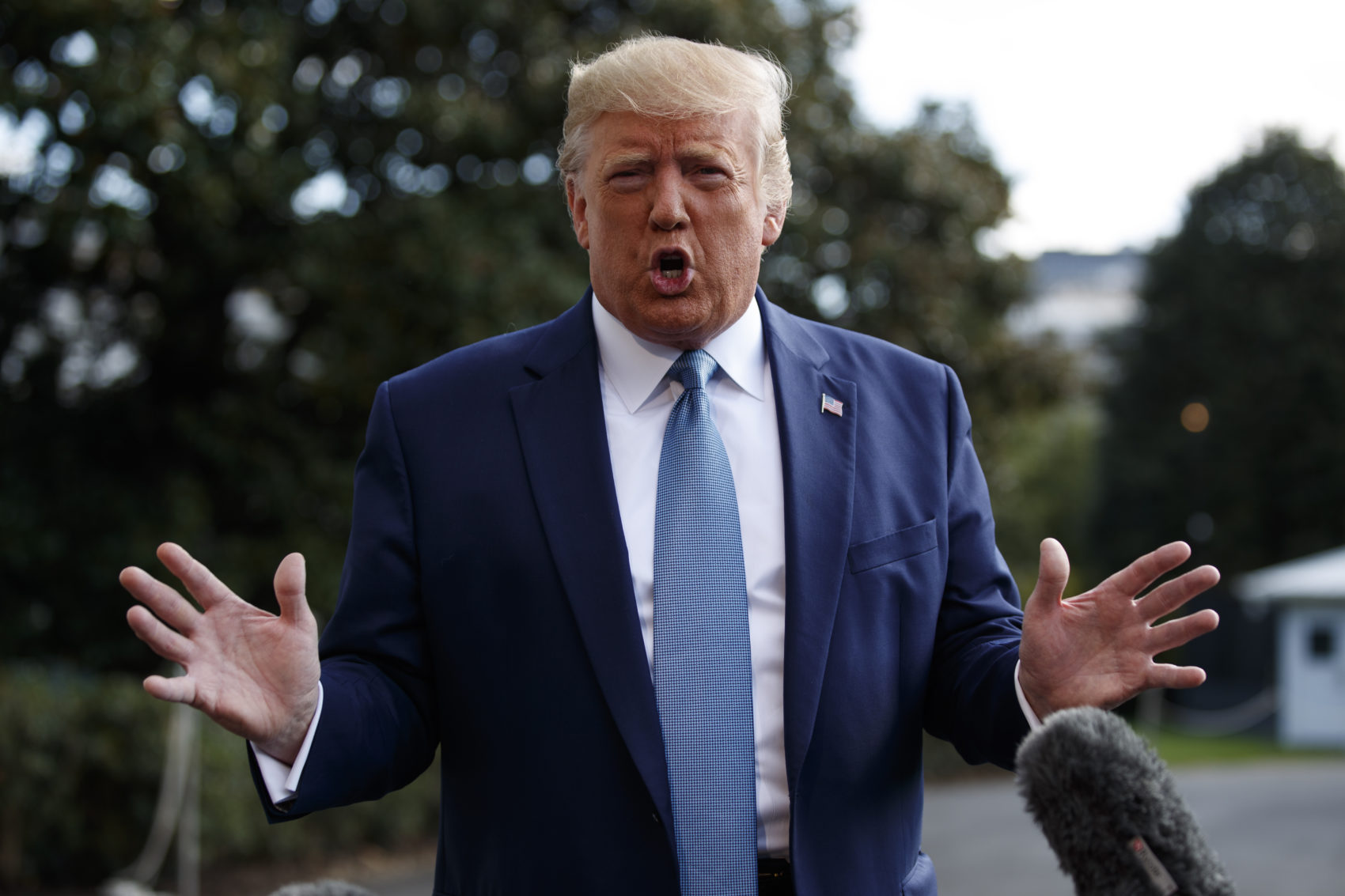 President Donald Trump talks to reporters on the South Lawn of the White House, Friday, Oct. 4, 2019, in Washington. (Evan Vucci/AP)