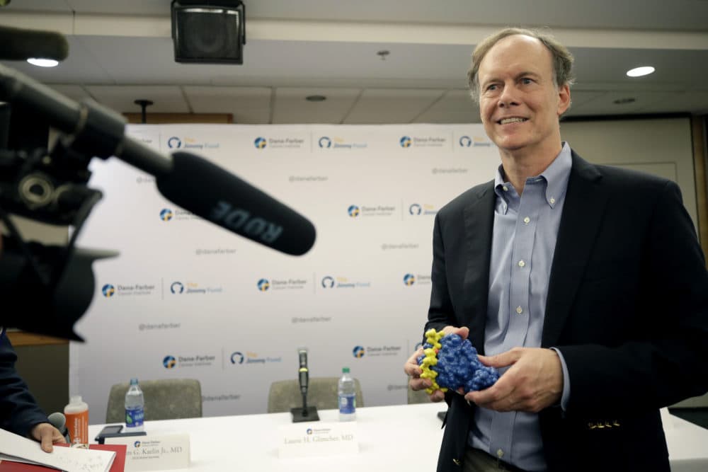 William G. Kaelin Jr. holds a model of his work as he speaks at a news conference, Monday, Oct. 7, 2019, in Boston, after he was awarded the Nobel Prize for Physiology or Medicine. Kaelin, who teaches at Harvard Medical School, shares the prize with Peter J. Ratcliffe and Gregg L. Semenza for their discoveries of how cells sense and adapt to oxygen availability, the Nobel Committee announced Monday. (Elise Amendola/AP)