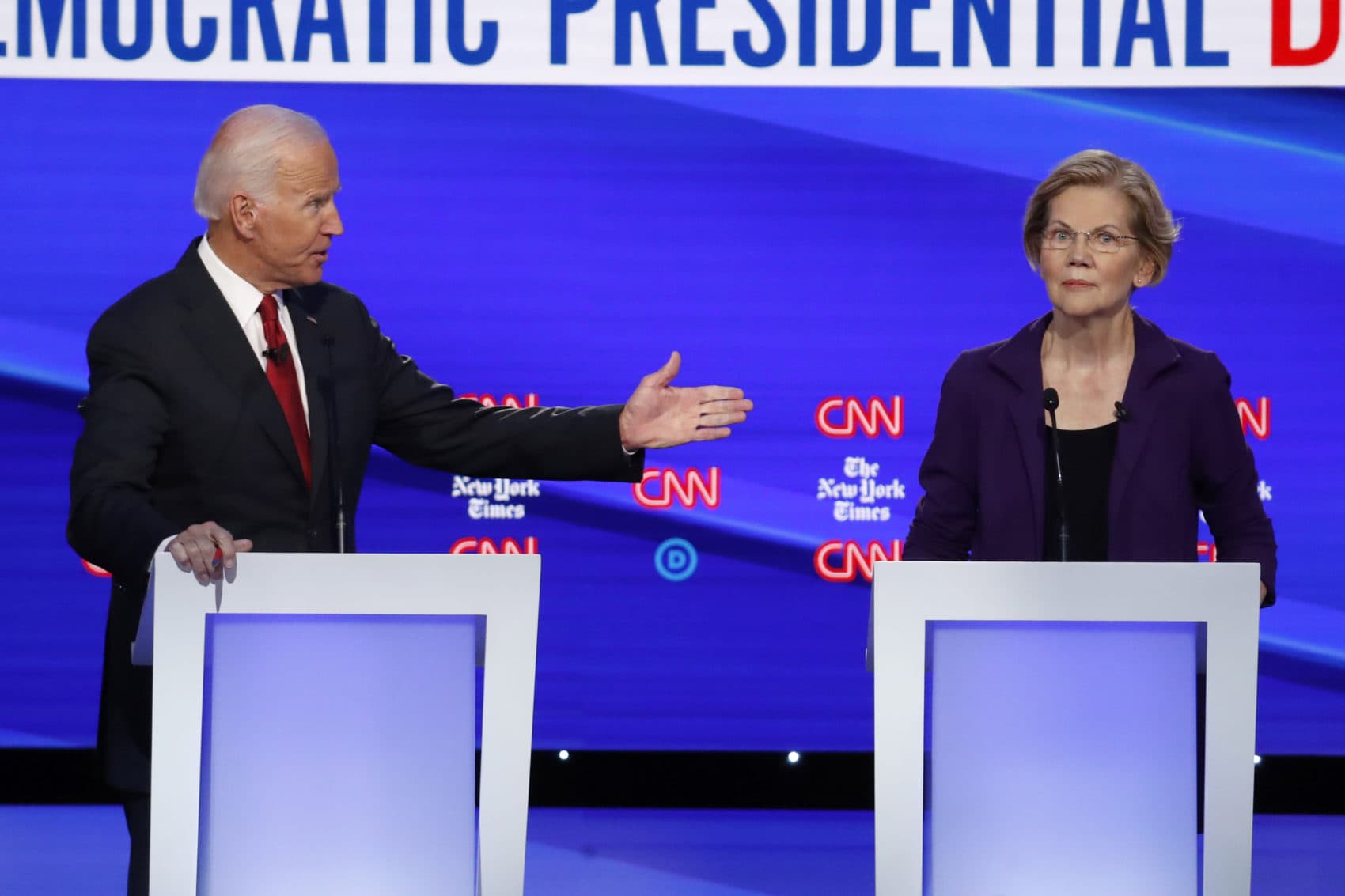 Democratic presidential candidate former Vice President Joe Biden gestures toward Sen. Elizabeth Warren, D-Mass., during a Democratic presidential primary debate at Otterbein University Tuesday in Westerville, Ohio. (John Minchillo/AP)