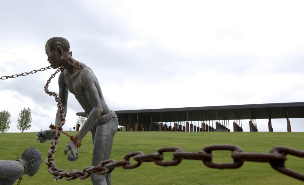 In this Sunday, April 22, 2018, file photo, a statue of a chained man is on display at the National Memorial for Peace and Justice, a new memorial to honor thousands of people killed in racist lynchings, in Montgomery, Ala. Facing an impeachment inquiry that he and supporters claim is illegal, President Donald Trump tweeted Tuesday, Oct. 22, 2019, that the process is a lynching. (Brynn Anderson/AP)