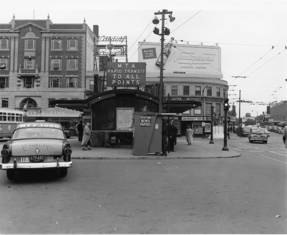 The original Out of Town newsstand positioned next to the MTA Harvard Square station kiosk in 1955. (Courtesy Cambridge Historical Commission)