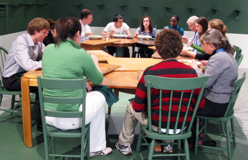 Trinity Church members sitting at Harries' &quot;One-Legged Table.&quot; (Courtesy)