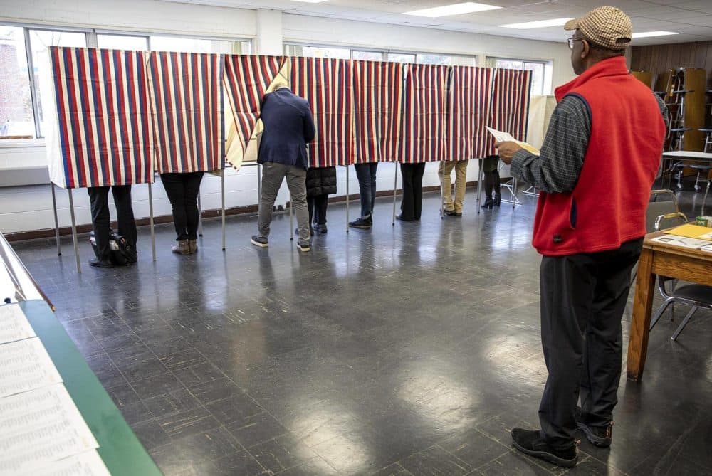 Residents vote at a polling place on Concord Avenue in Cambridge. (Robin Lubbock/WBUR)