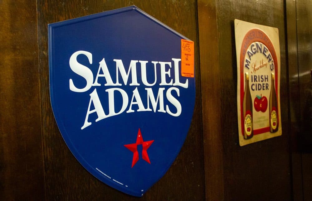 Among the many items for sale were signs advertising beer. (Meghan B. Kelly/WBUR)