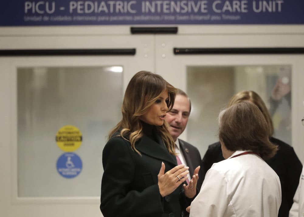 First lady Melania Trump, left, speak with pediatrician Eileen Costello, front right, as U.S. Secretary of Health and Human Services Alex Azar, behind center, looks on during a visit to Boston Medical Center in Boston on Nov. 6. (Steven Senne, Pool)