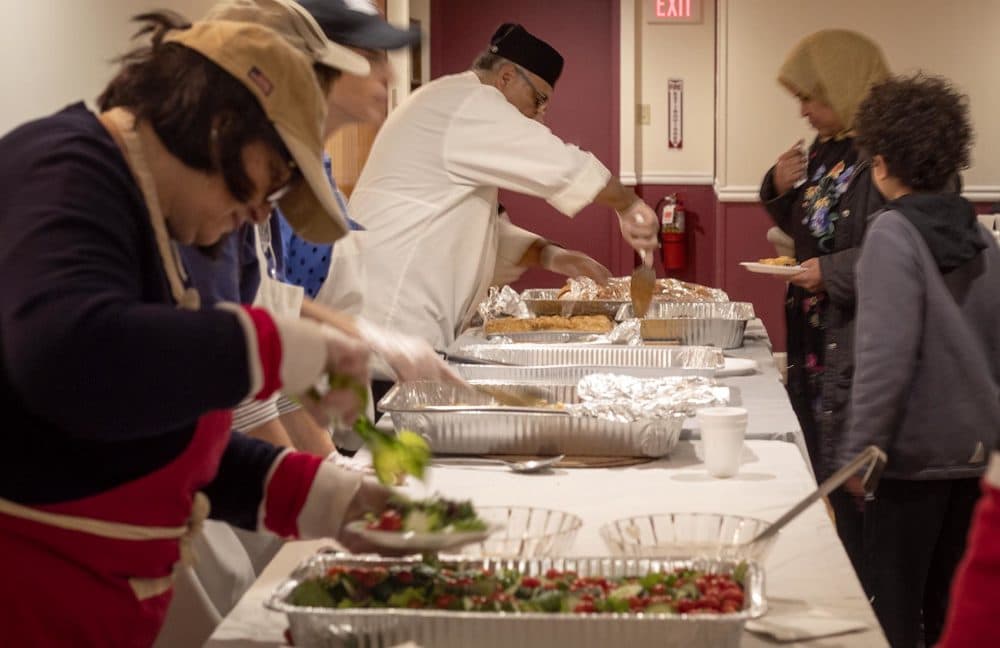 A Thanksgiving meal for Arabic-speaking refugees took place at the Hibernian Cultural Centre in Worcester. (Quincy Walters/WBUR)