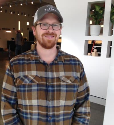 Brian Pollock, CEO of Theory Wellness, stands inside a cannabis store he plans to open soon in Chicopee, Massachusetts. (Nancy Eve Cohen/NEPR)