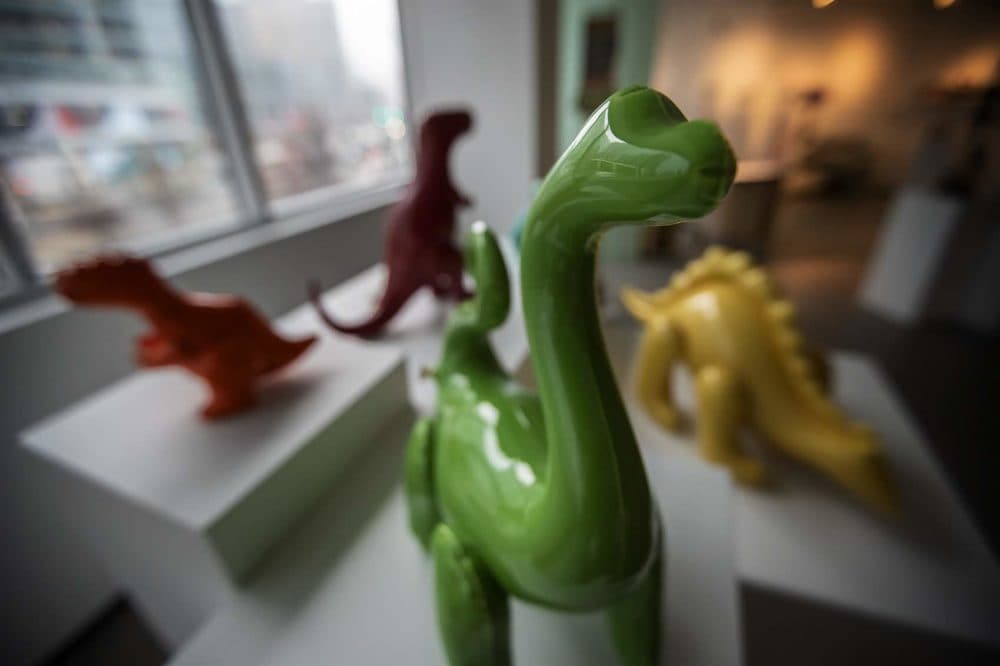 Brett Kern's assorted dinosaurs featured in &quot;Child's Play&quot; at the Society of Arts + Crafts. (Jesse Costa/WBUR)