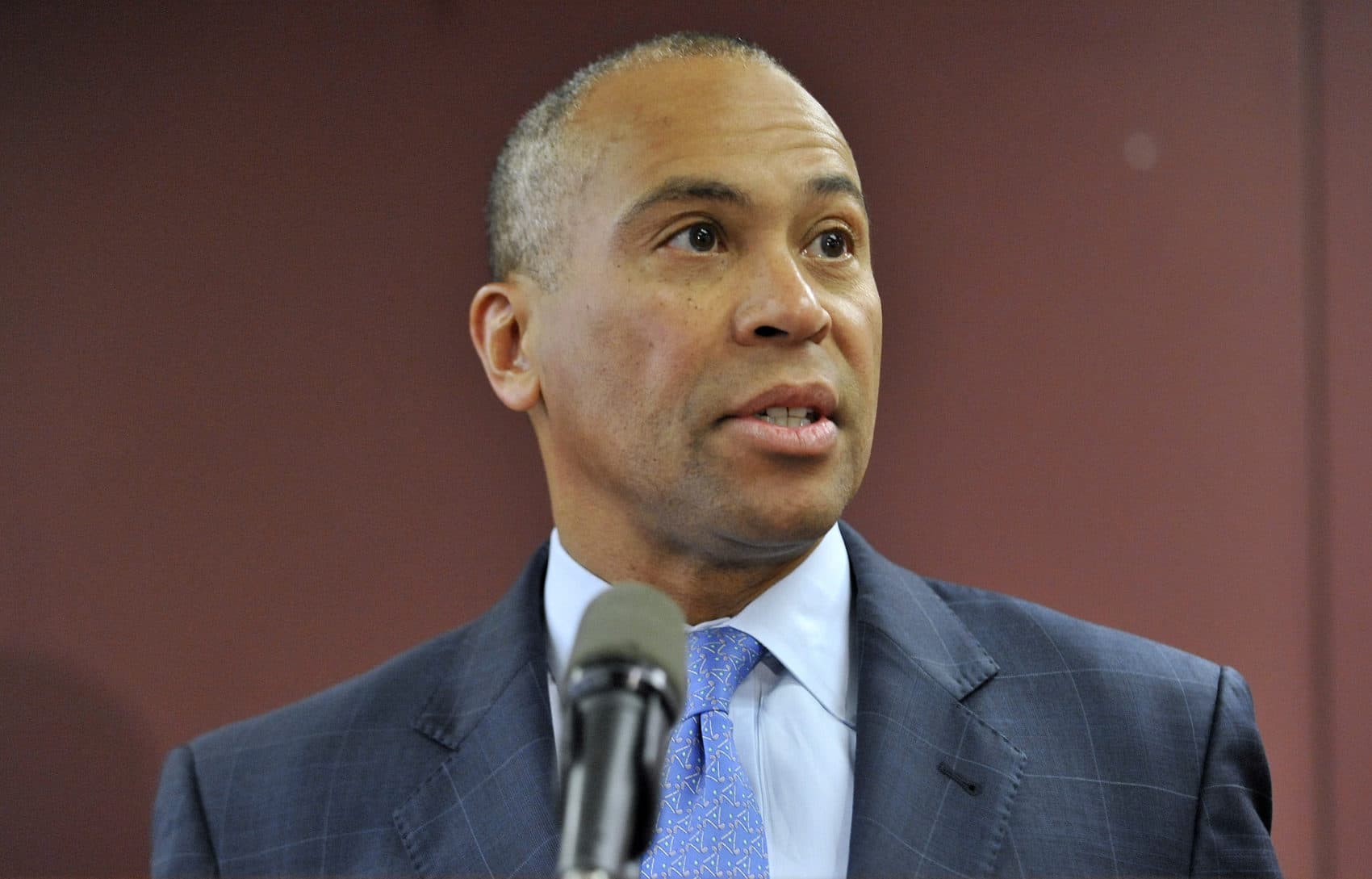 Former Massachusetts Gov. Deval Patrick speaks during a news conference in Boston in 2014. (Josh Reynolds/AP)