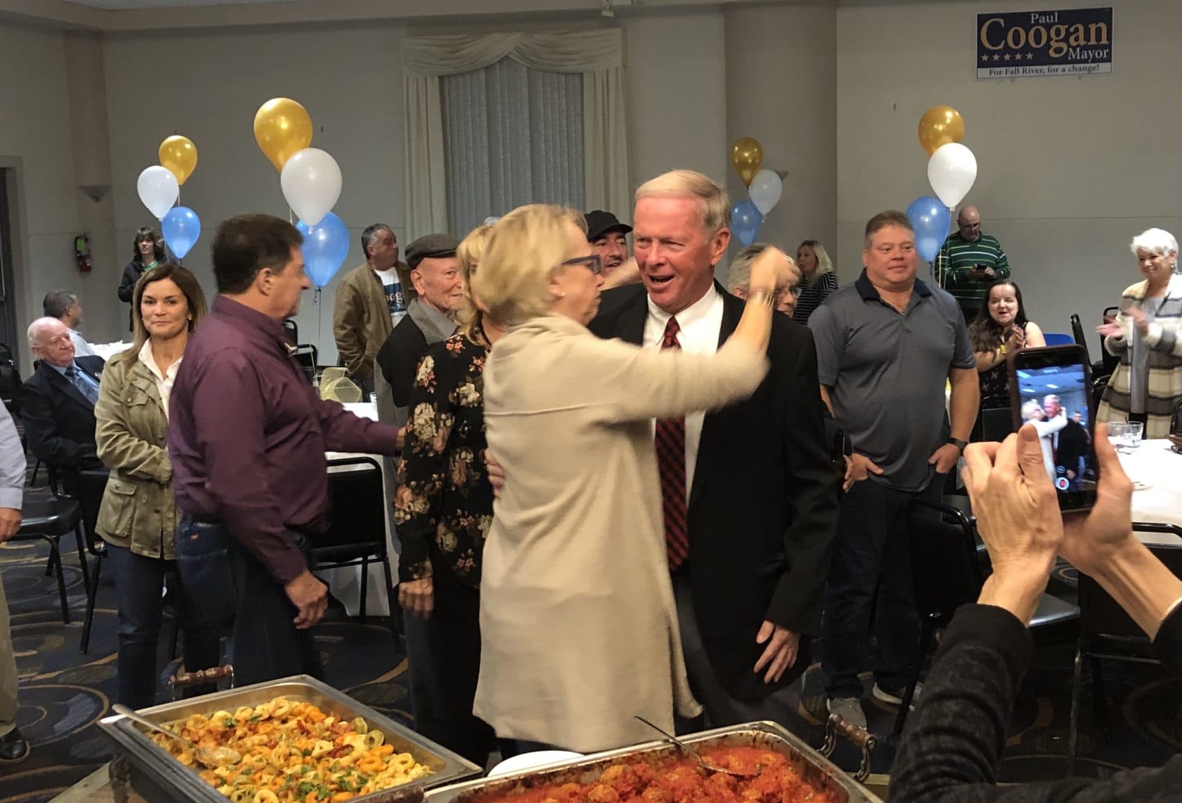 Fall River Mayor-elect Paul Coogan celebrates his victory with supporters. (Callum Borchers/WBUR)