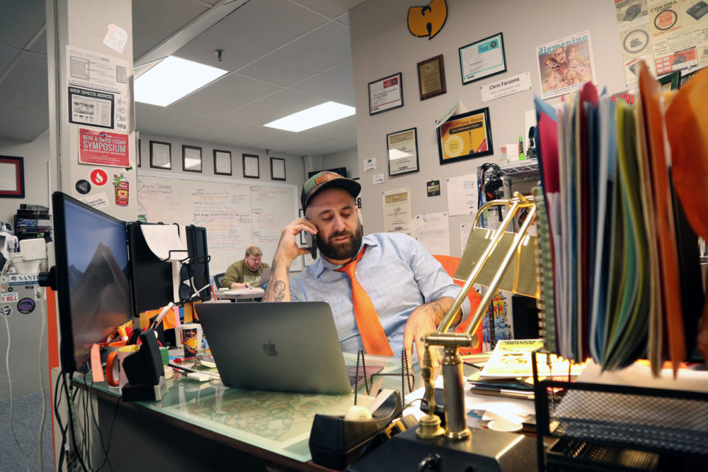 Chris Faraone, edtior-in-chief of DigBoston, in the office with publisher John Loftus. (Adrian/WBUR)