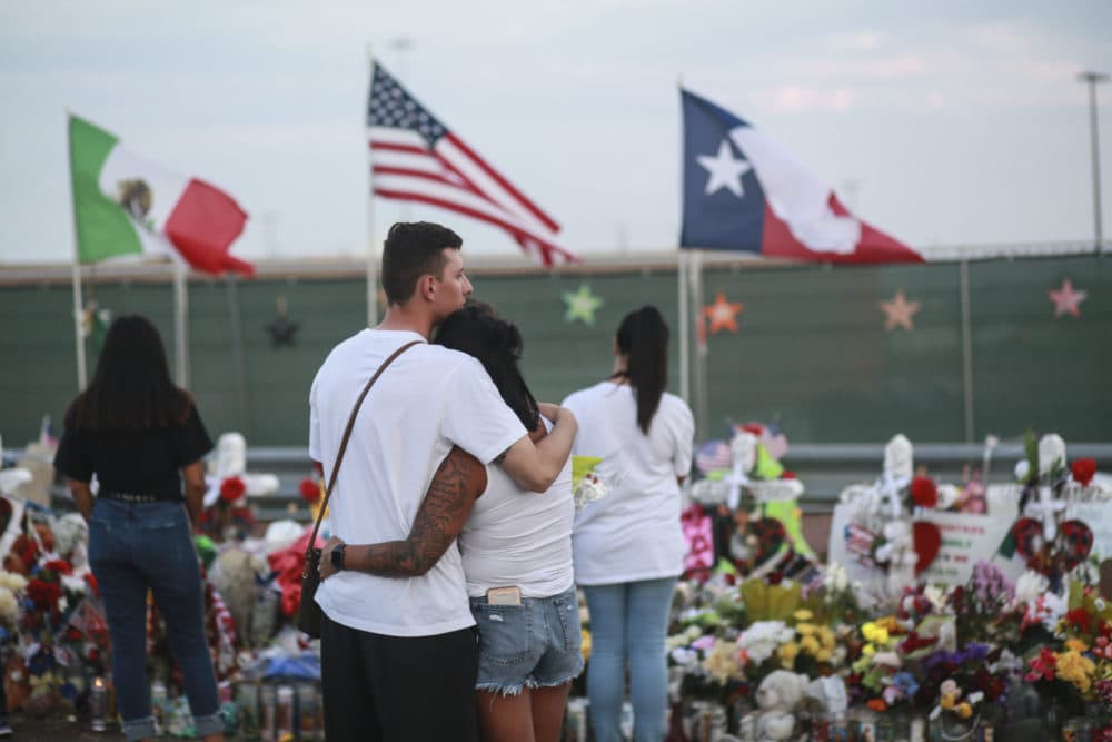 People gather at a makeshift memorial honoring victims of a mass shooting outside Walmart on Aug. 15, 2019 in El Paso, Texas. (Sandy Huffaker/Getty Images)