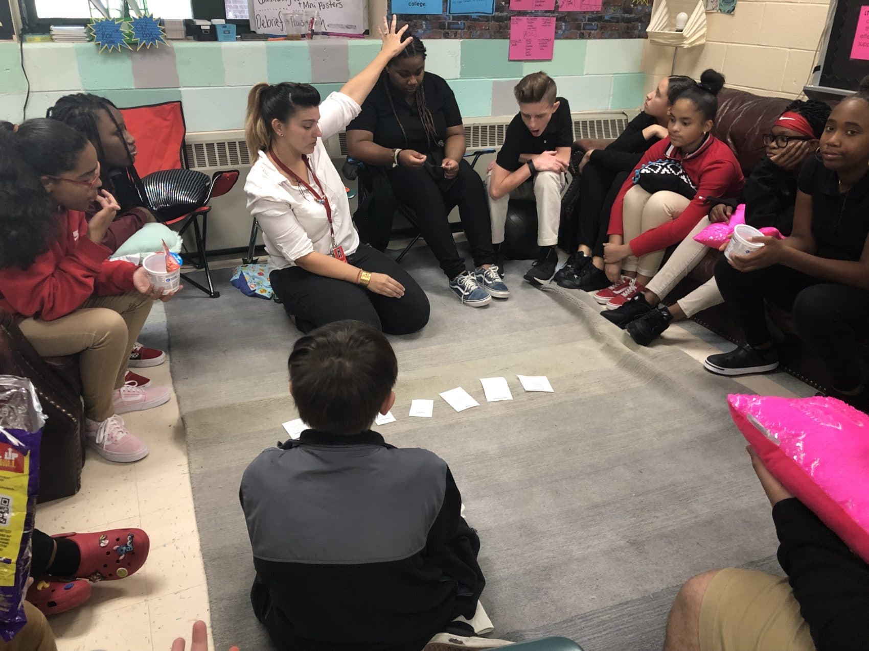 Springfield Renaissance teacher Samantha Vega leads seventh graders in an exercise during &quot;crew.&quot; (Grace Tatter/On Point)