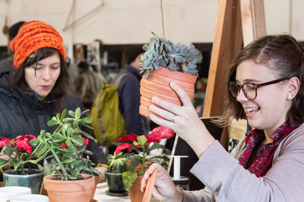 Diana Pauro sells some handmade pottery and succulents at a previous JP Flea holiday market. (Courtesy of JP Flea)