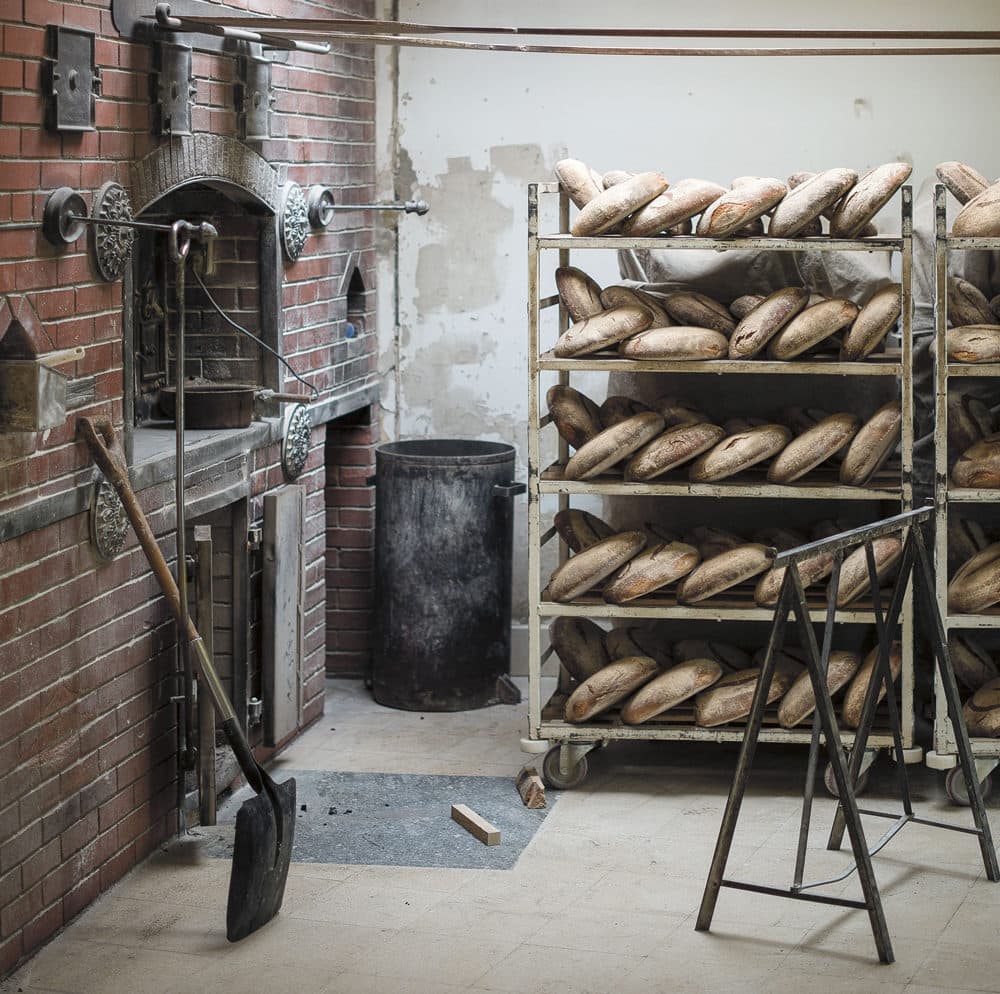 Loaves of bread near the oven. (Photo by Philippe Vaurès Santamaria)