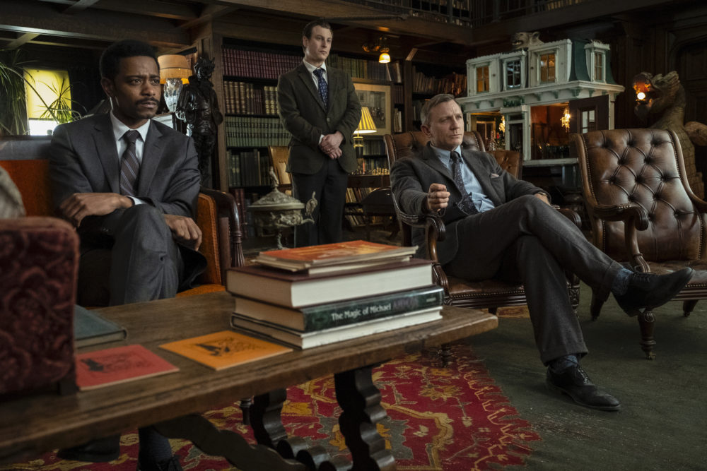 Left to right: Lakeith Stanfield as Lt. Elliott, Noah Segan as Trooper Wagner and Daniel Craig as Benoit Blanc in “Knives Out.” (Courtesy Claire Folger/Lionsgate)