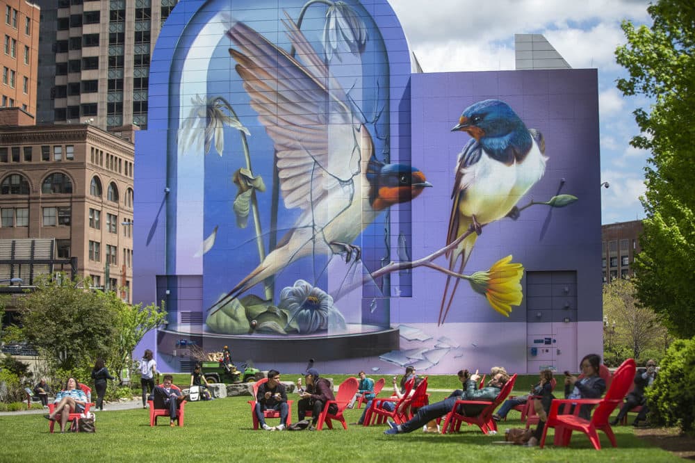 The Dewey Square mural for 2019 was painted by Dutch artist Stefan Thelen, aka Super A, and is called “Resonance.” It depicts two barn swallows, one of which is breaking through a glass enclosure filled with dead flowers. (Jesse Costa/WBUR)