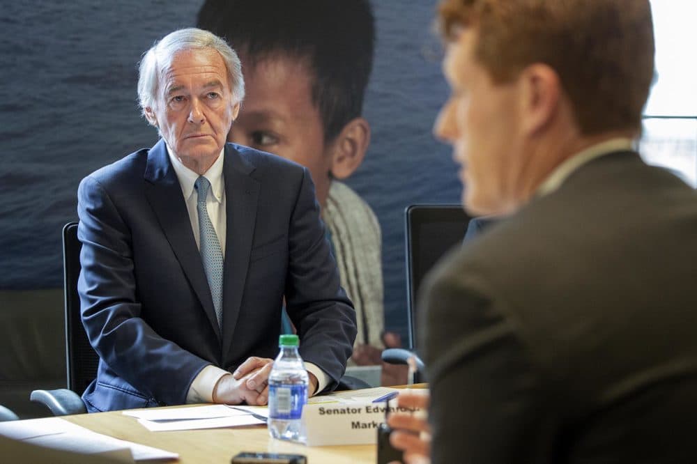 U.S. Sen. Edward Markey and U.S. Rep. Joseph Kennedy at a meeting of resettlement agencies, refugees and advocates in Boston. (Robin Lubbock/WBUR)
