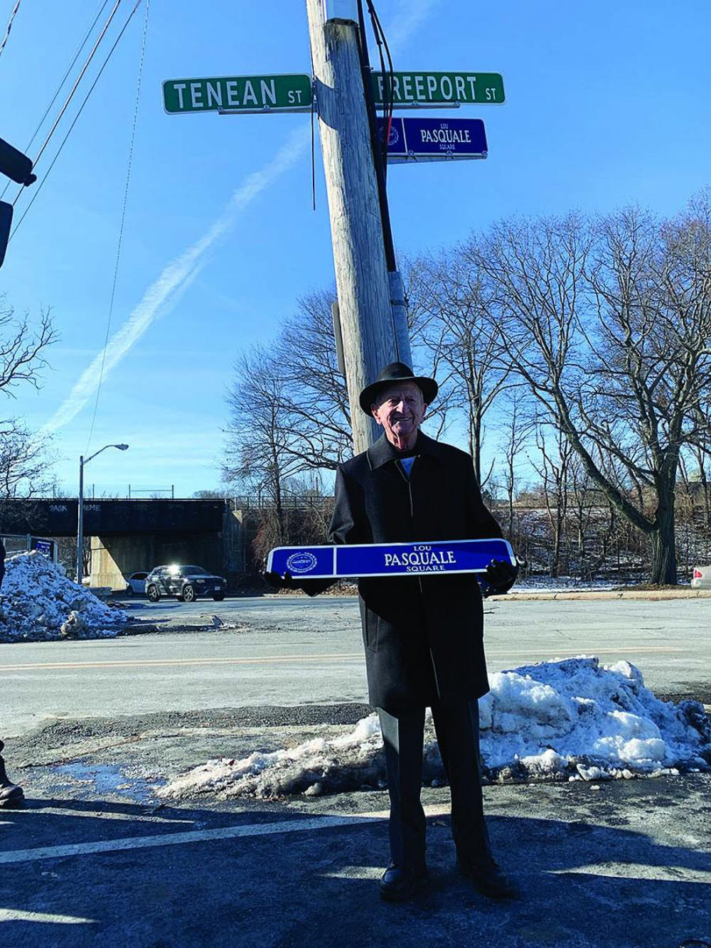 Lou Pasquale in front of the newly dedicated Lou Pasquale Square outside of Boston Bowl. (Daniel Sheehan/Dorchester Reporter)