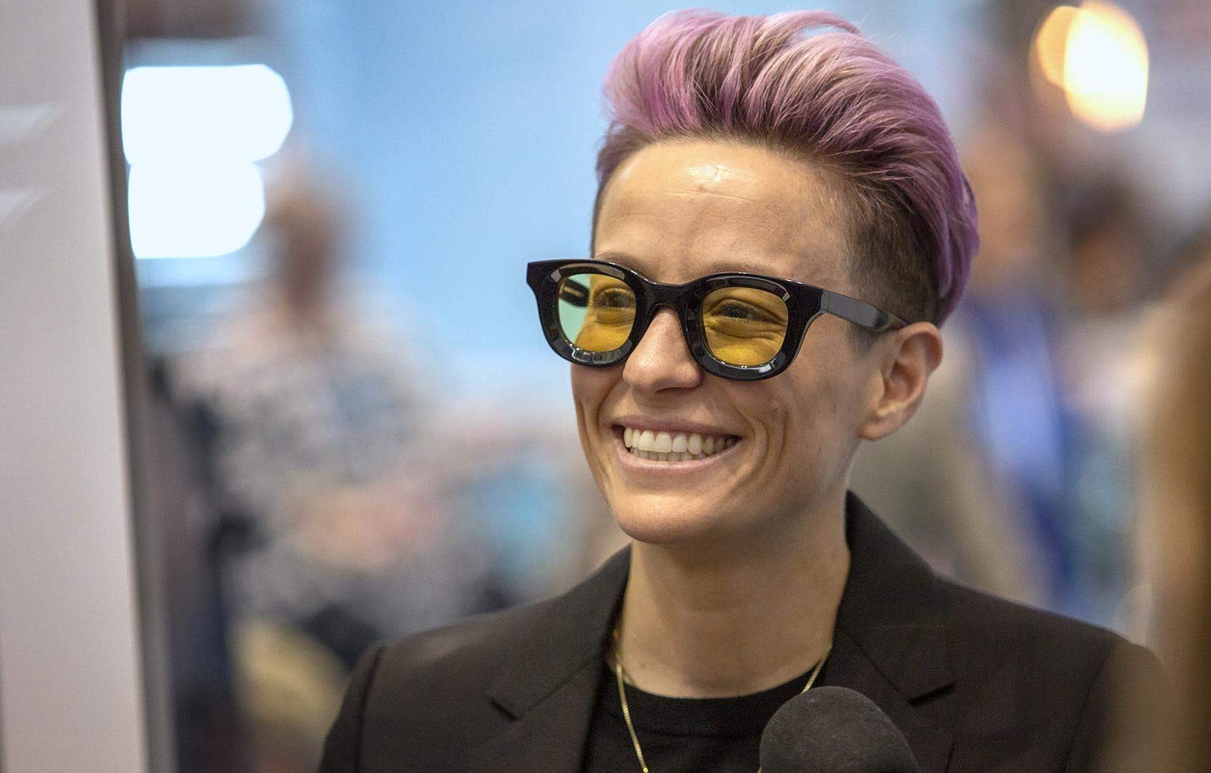 Megan Rapinoe talks with Here & Now's Peter O'Dowd. (Robin Lubbock/WBUR)
