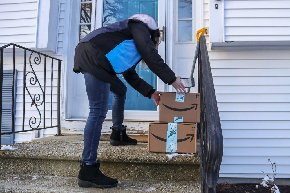 Lynne makes an Amazon Flex delivery in Worcester. (Adrian Ma/WBUR)