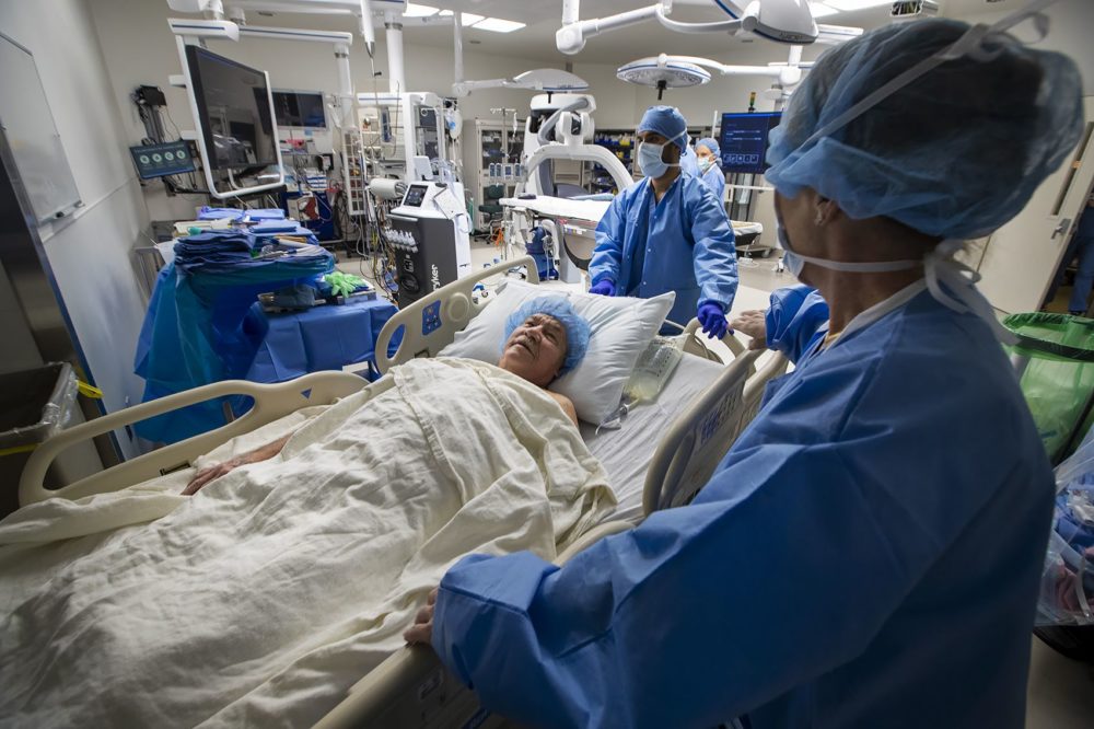 Patient Ralph Kee is wheeled into the operating room at Boston Medical Center. (Jesse Costa/WBUR)