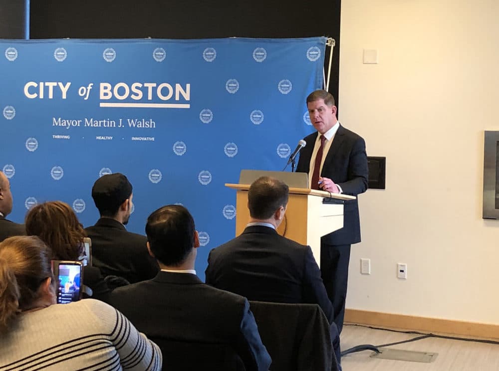 Boston Mayor Marty Walsh speaks at an event to sign amendments to the city's Trust Act. (Shannon Dooling/WBUR)