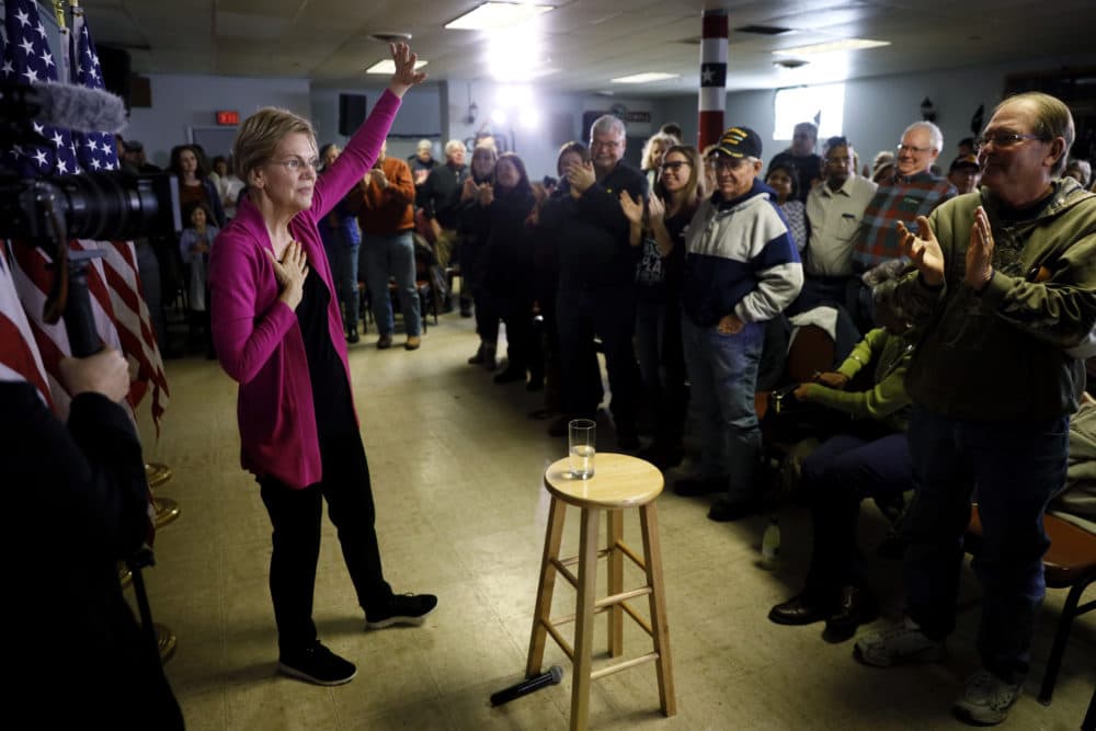 Democratic presidential candidate Sen. Elizabeth Warren, D-Mass., waves to audience members at the end of a town hall meeting on Dec. 16 in Keokuk, Iowa. (Charlie Neibergall/AP)