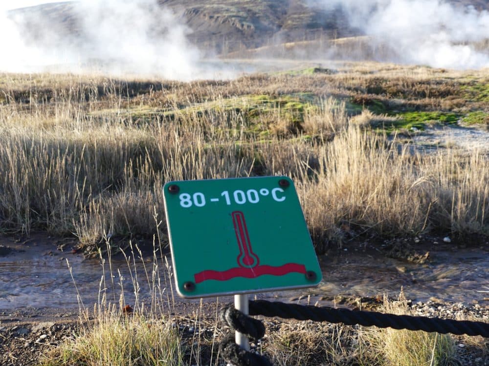 A sign warning tourists to stay away from the boiling water. (Karyn Miller-Medzon/Here &amp; Now)