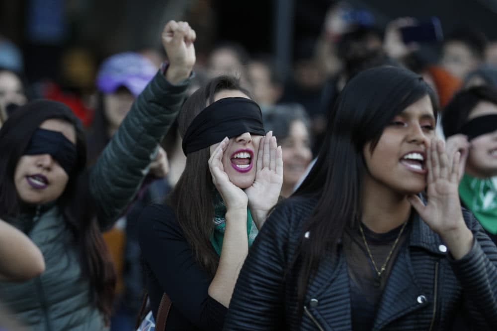 Women chant the &quot;A rapist in your path&quot; feminist anthem in protest against a series of videos of Mexican men and male teens appearing to mock the chant, in Mexico City. (Rebecca Blackwell/AP)